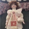 Value of a Musical Dynasty Doll - doll wearing a pink period dress