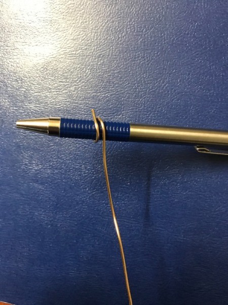 Wire Spiral Picture Holder - wrap standing end around a pen