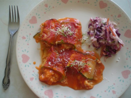 Zucchini Manicotti Rolls on plate with salad