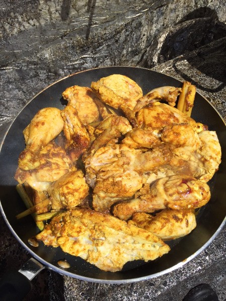cooked chicken pieces in pan
