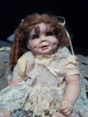 Identifying a Legacy Porcelain Doll - doll wearing yellow dress