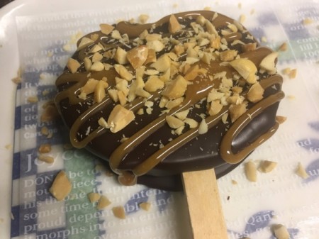 chopped peanuts on Caramel Apple Slice Pops
