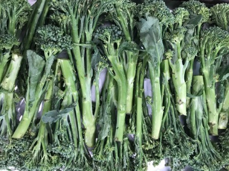 raw broccolini in dish
