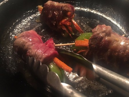 Balsamic Steak and Veggie Rolls cooking in pan