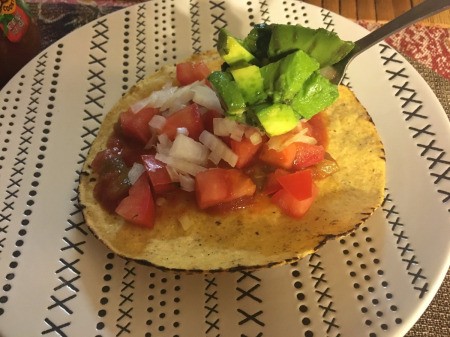 assembling Tostada on plate