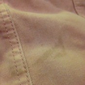Repairing a Stained Denim Jacket - stain on pink jacket