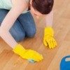 Cleaning an apartment floor with bleach water.