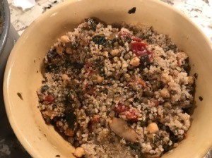 Lentils and Quinoa with Shiitake Mushrooms, Tomatoes and Spinach in bowl