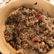 Lentils and Quinoa with Shiitake Mushrooms, Tomatoes and Spinach in bowl