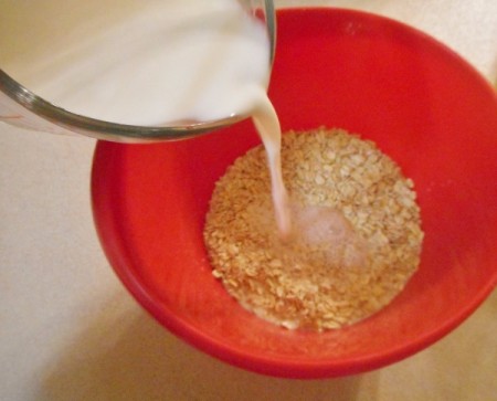 pouring milk in oats