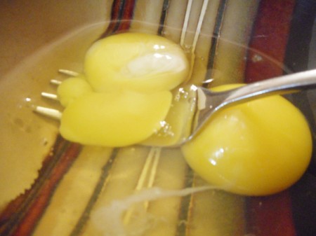 mixing eggs and oil
