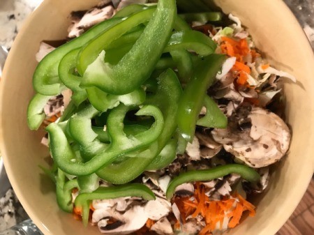 cut vegetables in dish for noodles