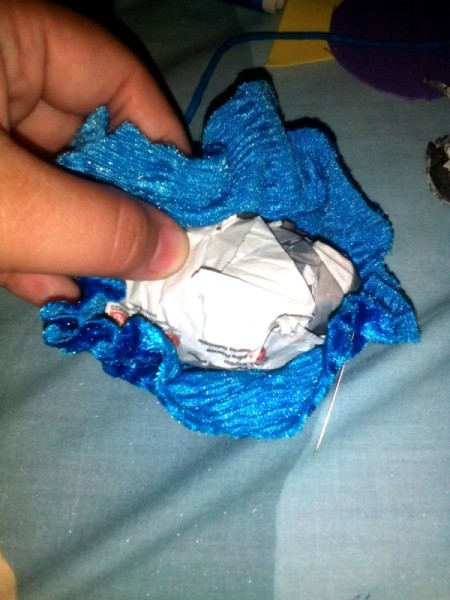 Furry Key Chain - place the large ball inside the pouch and tighten the thread to enclose the ball