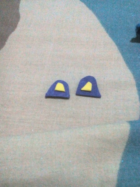 Furry Key Chain - cut two ears from the art paper and add a smaller piece to the center and glue together