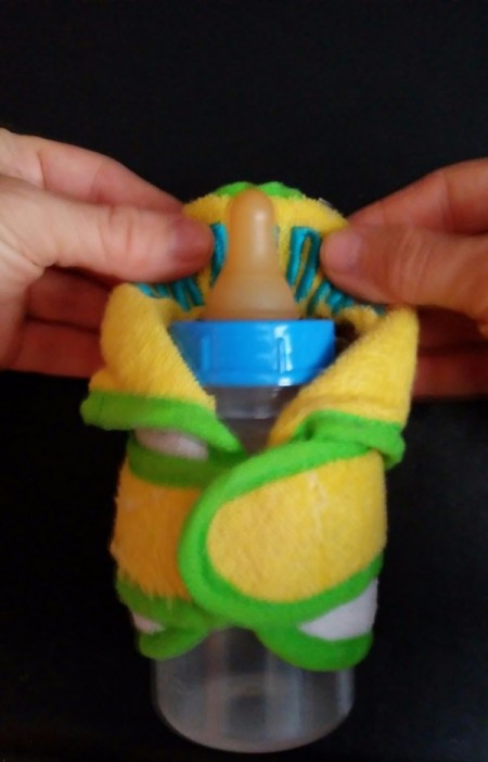 Baby Bib Robe - Velcro secured and bib adjusted behind the nipple