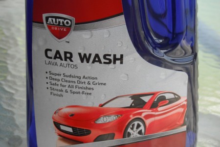 A bottle of Car Wash soap for cleaning vinyl siding and gutters.