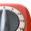 A red kitchen timer.