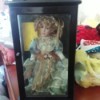 Value of a Knightbridge Collection Doll - doll in a black box with glass front