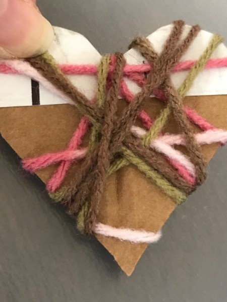 Yarn Heart Garland Decoration - begin wrapping yarn in random directions