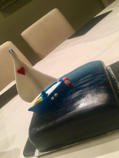 Homemade Edible Food Paint on cake with sailboat on top