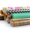 Rolls of colorful wrapping paper on a white background.