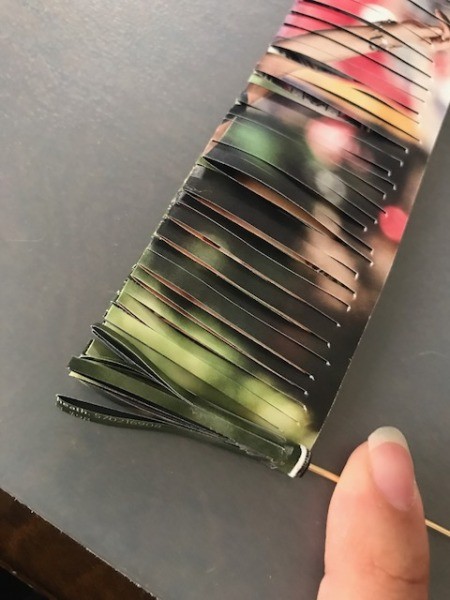 Recycled Catalog Flowers - begin wrapping the paper around the wire