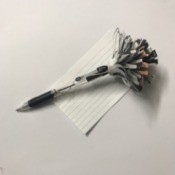 Recycled Catalog Flowers - flower on pen