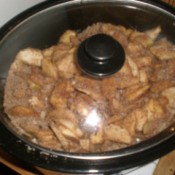 apples and sugars in covered crockpot