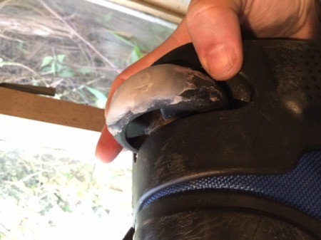 Repairing a Lopsided Luggage Wheel - sand wheel, mix product and then mold to shape and allow to dry