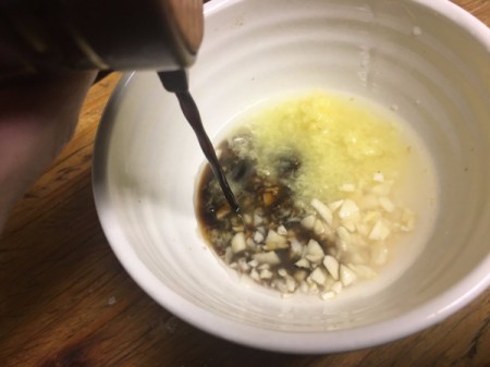 butter, garlic and spices in bowl