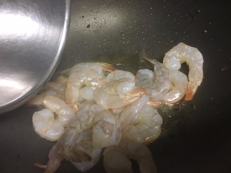 cooking prawns in pan