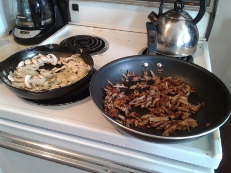 pulled pork pan and onions and mushrooms in pan