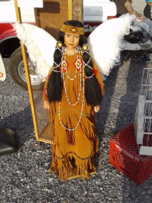 Value of Life Sized Native American Porcelain Dolls