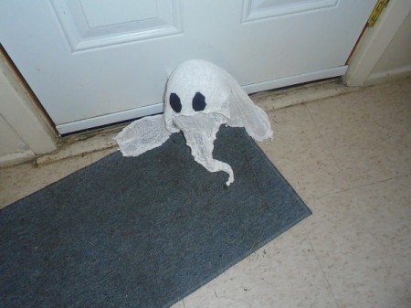 Halloween Ghost - ghost on floor by door