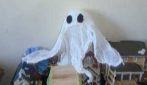 Halloween Ghost - ghost on top of shelf