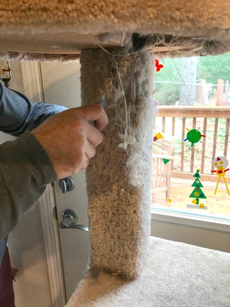 Refinishing a Cat Tree - cutting away old carpet with box knife