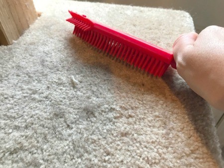 Refinishing a Cat Tree - remove cat hair from carpeted shelves with rubber brush