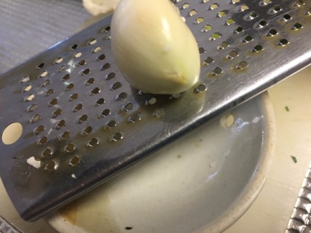 grating garlic