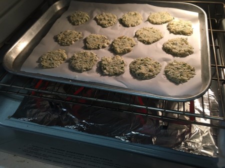 unbaked Cauliflower Cheese Crisps in oven