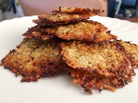 pile of Cauliflower Cheese Crisps on plate