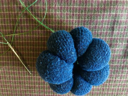 Mini Sock Pumpkins - go through the center again and continue making ridges