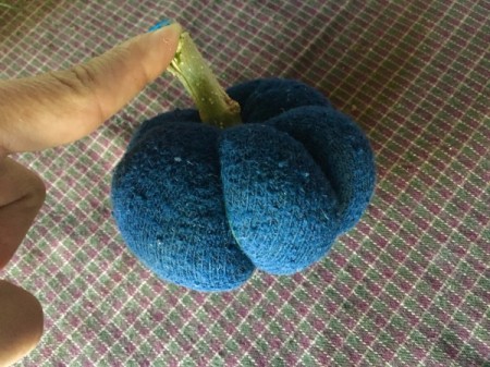 Mini Sock Pumpkins - stick the piece of branch in the center for the stem, glue if needed