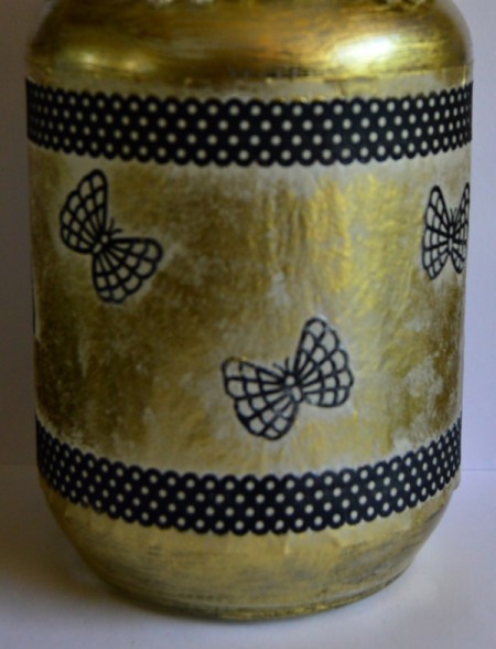 Silhouette Jar Storm Lantern - use Modge Podge and dusting powder to dab color around the tape and butterflies and the exposed parts of the jar