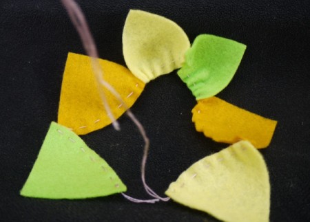 Felt Flower Brooch - join all of the pieces together alternating colors as you go