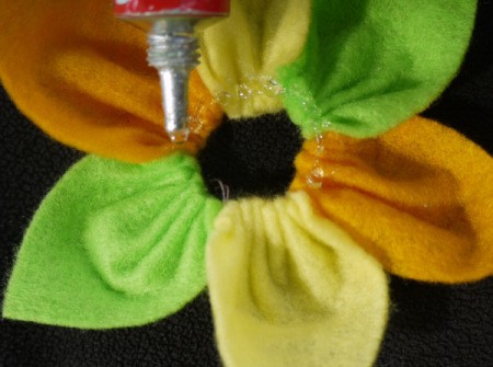 Felt Flower Brooch - apply glue around the center of the flower