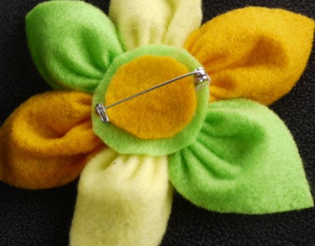 Felt Flower Brooch - cut a smaller piece of felt to hide the stitching and glue in place