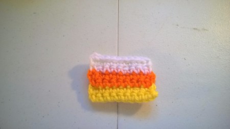 Crocheted Candy Corn Butterfly Magnet - three rows completed