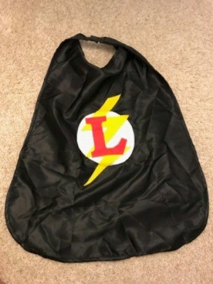 A black cape with the colored The Flash logo in the center.