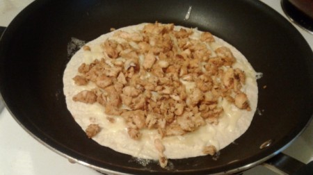 cooked chicken on tortilla