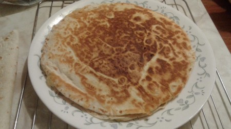 browned quesadilla on plate